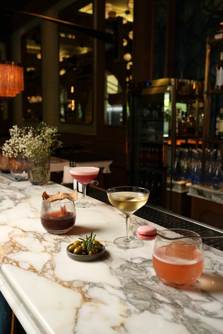 Various cocktails on bar counter
